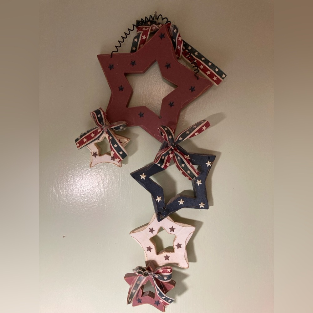 Patriotic 5 star wall hanging. Made out of wood & united with wire.